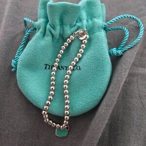 TIFFANY & CO. Return to Tiffany Women's Bracelet - Elegant Sterling Silver Desig